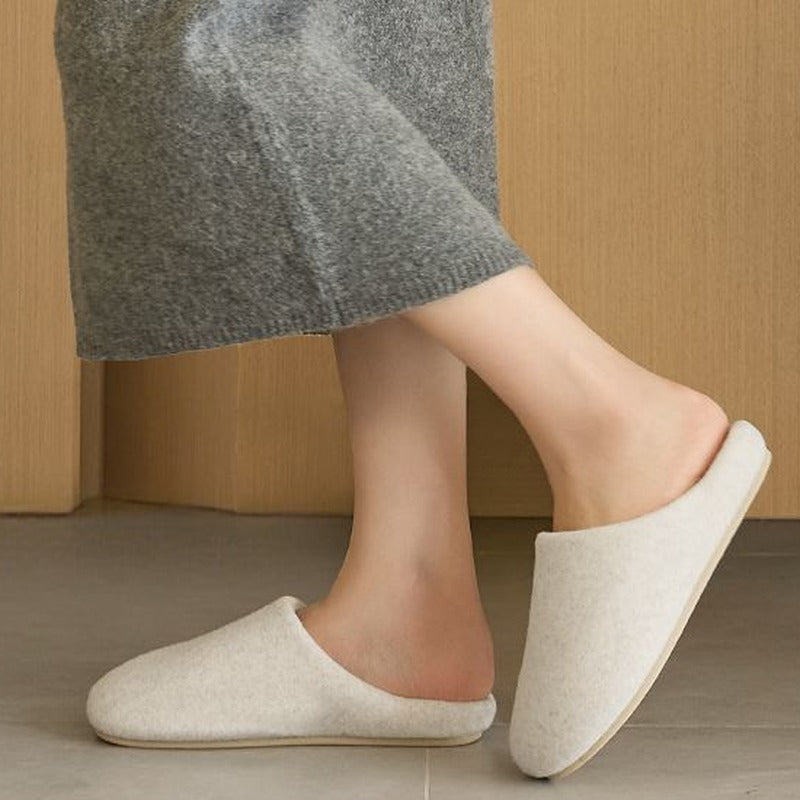 CloudHush Home Slippers in Beige worn at home on a tiled floor